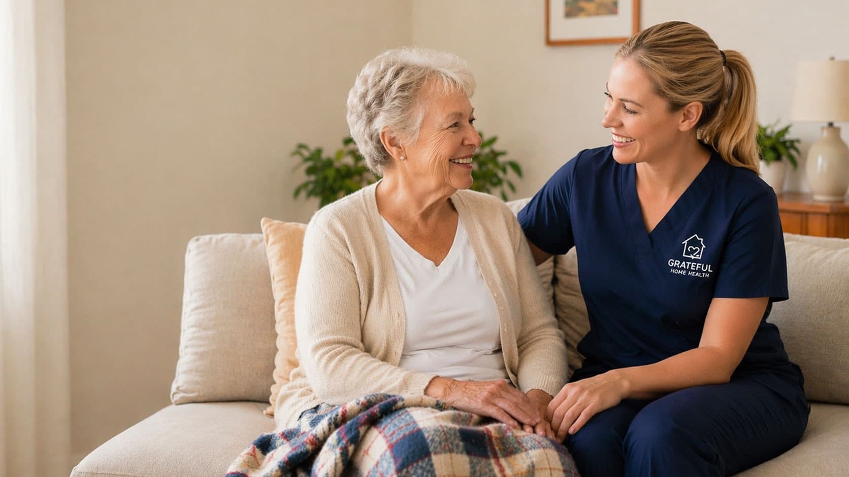 Caring home health professional with patient